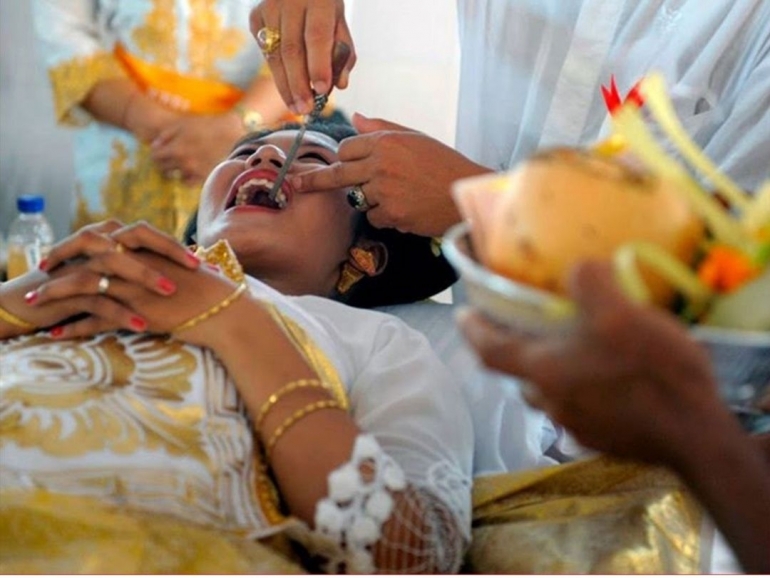 Ilustrasi budaya Hindu Bali potong gigi (Sumber: I Gede Mariana)