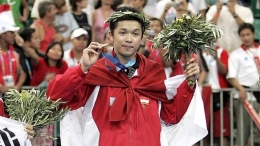 Taufik Hidayat saat meraih emas Olimpiade Athena 2004. - Dok. INews.