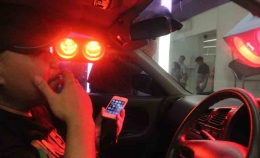 Tes dengan lampu besar di mobil pribadi. (Ganendra)