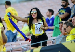 (Fans Wanita Ekuador saat mendukung tim kesayangannya)