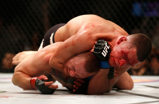 Diaz submitted McGregor to win the first fight in UFC 196. Photo by Getty Image