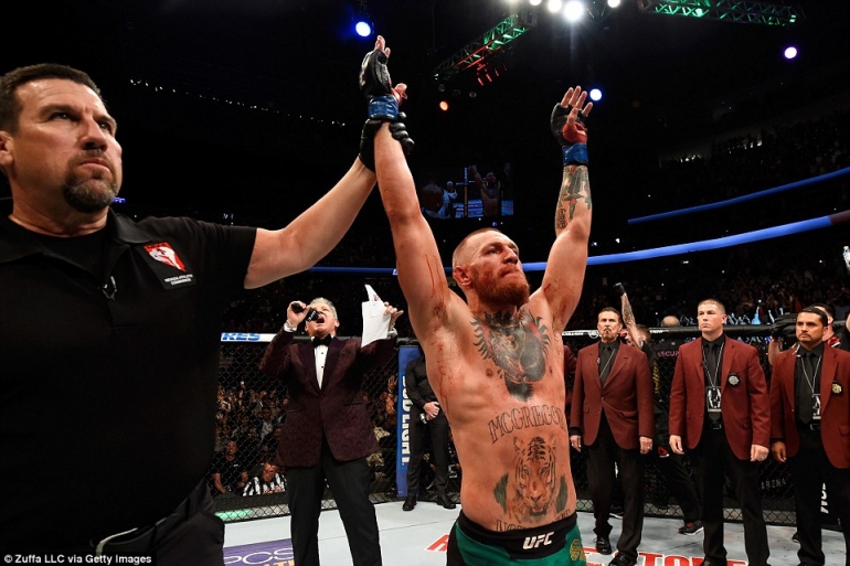 McGregor claims victory over Diaz in their second fight at UFC 202 Photo by Zuffa LLC via Getty Image