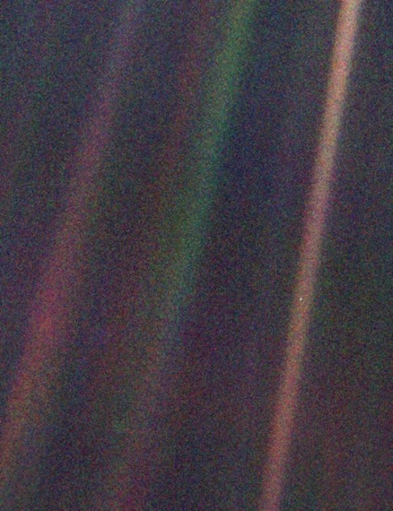 Photograph of planet Earth taken by Voyager 1 space probe from 6 billion kilometers away
