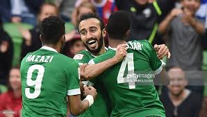 (aksi Mohammed Al Sahlawi usai mencetak gol untuk Arab Saudi / sumber : gettyimages)