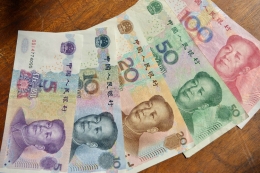 Yuan (Renminbi) Tiongkok yang hanya bergambar satu tokoh saja. (Foto: Wall Street Journal)