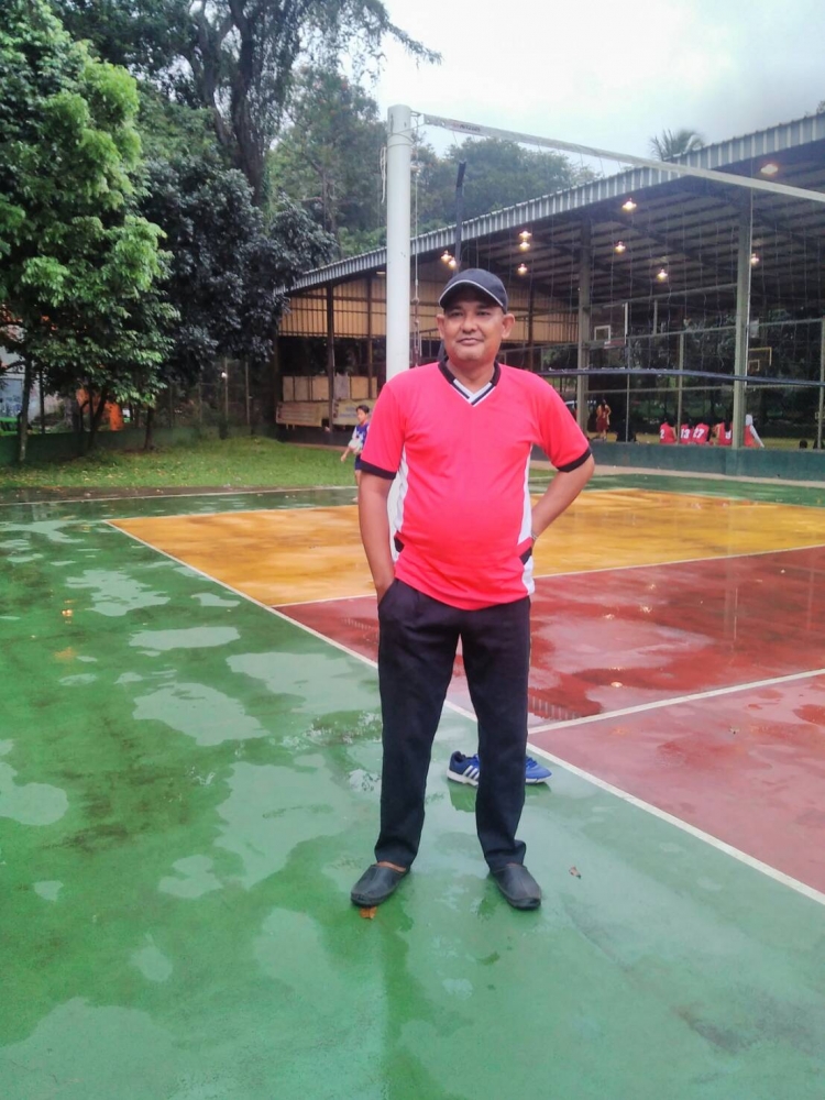 Yan Maha si pelatih voli lulusan sarjana hukum