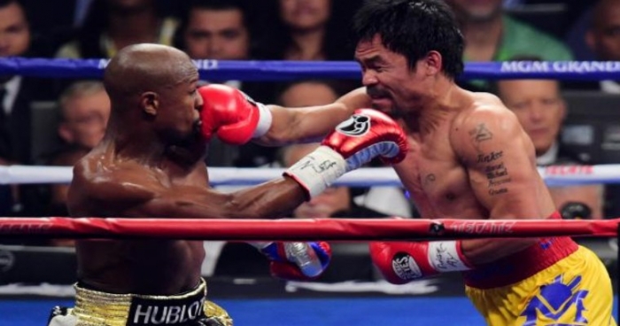 Floyd Mayweather : Floyd Mayweather saat mengalahkan petinju Filipina Many Pacqiao dan merebut gelar juara WBO yang beberapa waktu lalu gelar di cabut karena pelanggaran disiplin.
