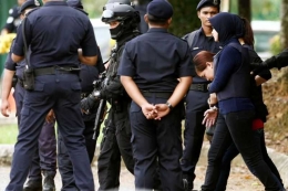 Aisyah dan Doan berada dalam pengawasan ketat pihak kepolisian Malaysia. Source: Okezone News