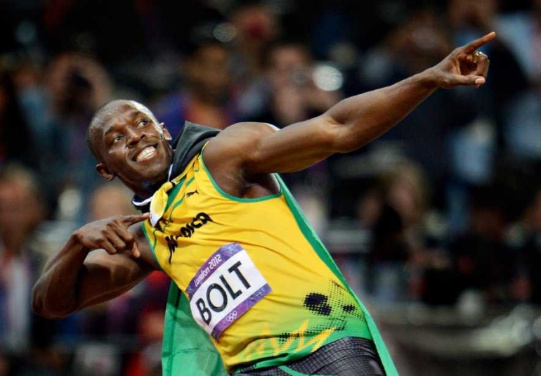 Gaya khas Bolt yang menjadi Icon dunia. Photo: images.lpcdn.ca
