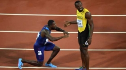 Justin Gatlin memberi penghormatan kepada Usain Bolt (www.cbc.ca)