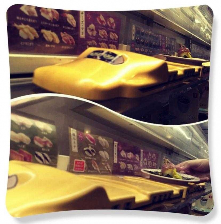 Bentuk Shinkansen mengantarkan sushi ke meja pengunjung (dokumentasi pribadi)