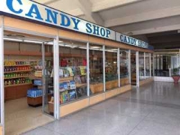 Candy Shop Jual Permen, Buku Travel Cendera Mata Dan Minuman Kaleng