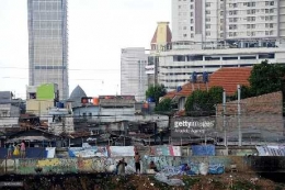 Salah satu Kontras Hunian di Jakarta (2016) | Getty Images