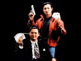 Poster God of Gambler II (1990) yang menampilkan Chow Yun Fat (duduk) dan Andy Lau (berdiri) - cinema.com.my