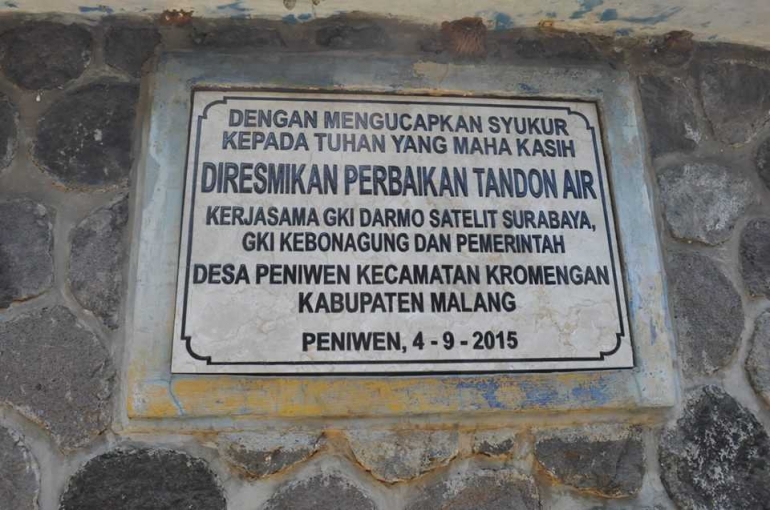 Plakat bersejarah telah menempel pada tandon air di Peniwen. Dokumentasi Joko Dwi Purnomo.