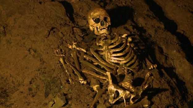 A replica of Cheddar Man's skeleton now lies in Gough's Cave