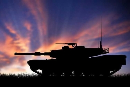 Modern heavy tank isolated in front a sunset