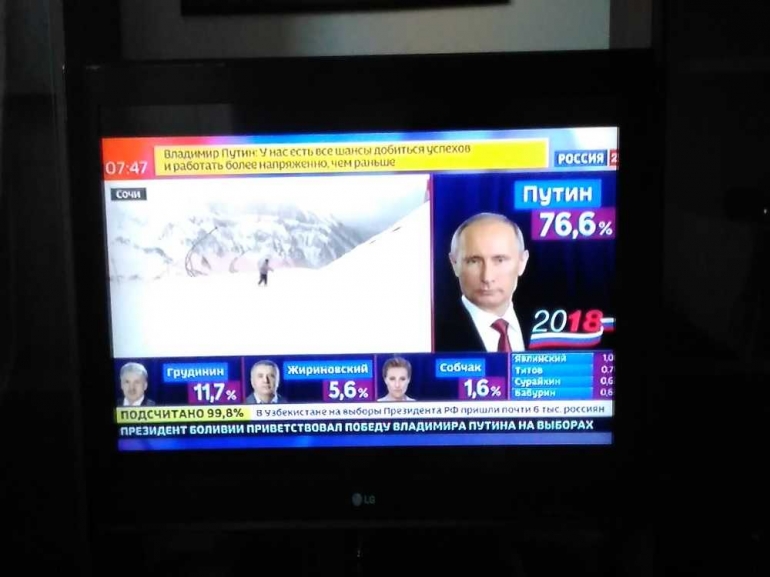 Putin menang telak melawan 7 penantang Capres Rusia. Sumber: TV Rusia pada berita pagi tgl 20 Maret 2018