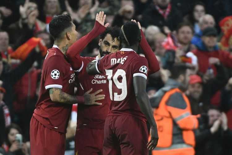   Trio penyerang Liverpool, Roberto Firmino, Sadio Mane, dan Mohamed Salah (AFP/FILIPPO MONTEFORTE )