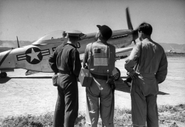  Indentification is worn by U.S. flyer at base. Sign, in Korean, asks help should he be shot down. (The LIFE Picture Collection/Getty Images)