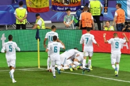 Para pemain Real Madrid merayakan gol Gareth Bale ke gawang Liverpool pada final Liga Champions 2018 di Kiev, 26 Mei 2018. 