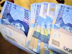 Angpau jaman now, sudah jarang uang kertas nomina seribu atau dua ribu rupiah | Foto: Rifki Feriandi 