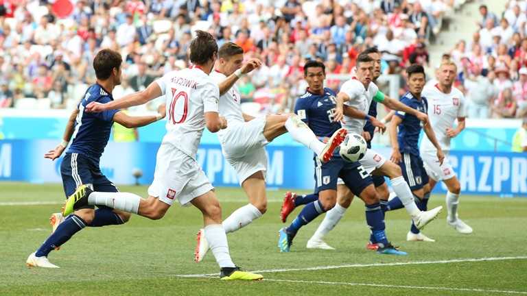 Polandia menang atas Jepang, namun keduanya mendapatkan apa yang mereka harapkan. FIFA.com