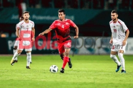 Gelandang Zulfiandi tengah mengontrol bola pada pertandingan Indonesia vs Palestina dalam lanjutan Grup A Asian Games 2018 di Stadion Patriot, 15 Agustus 2018. 