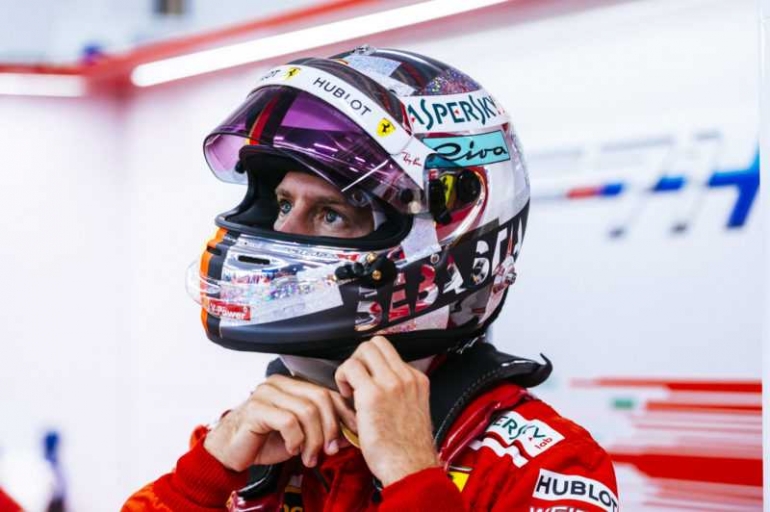 Sebastian Vettel di GP SIngapura 2018 (Sumber: theformula1girl.com)