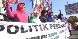 ilustrasi: Puluhan Caleg Perempuan di Banda Aceh melakukan aksi longmarch dukung pemilu damai di Aceh, Rabu (12/3/2014) (Kompas.com/ Daspriani Y Zamzami)