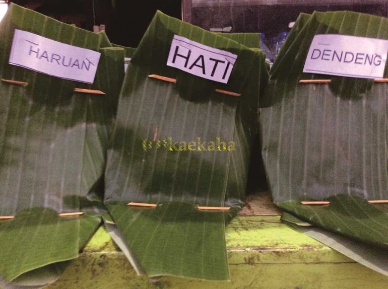 Nasi kuning bungkus daun pisang khas Banjarmasin (Foto : @kaekaha)