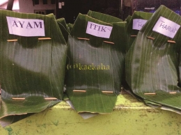 Nasi kuning lauk ayam, itik dan haruan (Foto : @kaekaha)