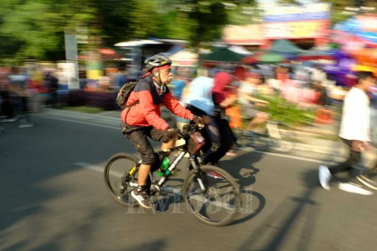 Polri Tilang Pembawa Wanita Sepeda