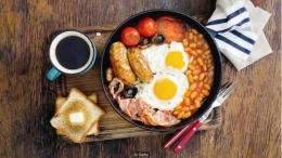 Satu analisis menemukan bahwa orang yang membuat sarapan sebagai makanan terbesar lebih cenderung memiliki indeks massa tubuh yang lebih rendah (Kredit: Getty)
