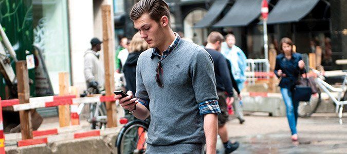 Using Smartphone while walking via www.laptopmag.com