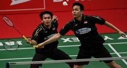 Duo Daddy Ahsan-Hendra Tua Tua Keladi (Foto: Bay Ismoyo/AFP)