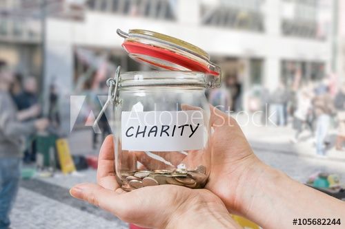 https://stock.adobe.com/lu_de/images/man-standing-on-street-is-collecting-money-for-charity-and-holds-jar-with-coins/105682169