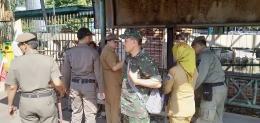 Babinsa Pelda Suwartono bantu back up pengamanan penertiban|Dokumentasi pribadi 