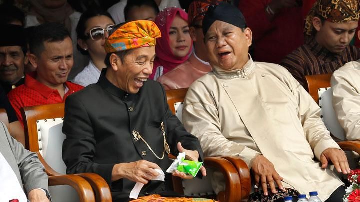 Jokowi dan Prabowo [Foto: Darren Whiteside/REUTERS]