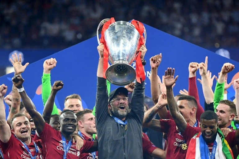 Jurgen Klopp dan Trofi Liga Champions (Foto Getty Images) 