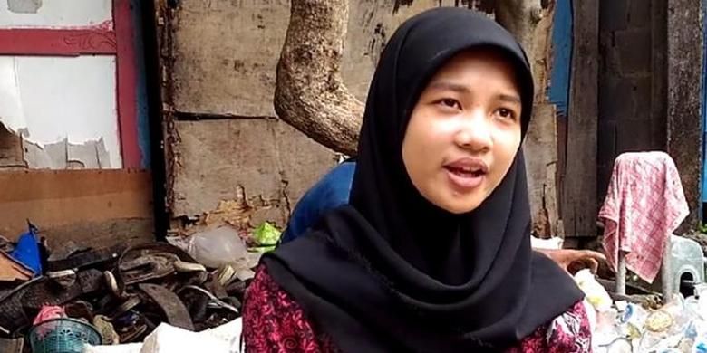 Irma, anak pemulung sampah yang lulus sarjana cumlaude (foto:TribunJateng)