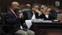 Idham Amiruddin saat memberi kesaksian di sidang Mahkamah Konstitusi (sumber foto: liputan6.com)