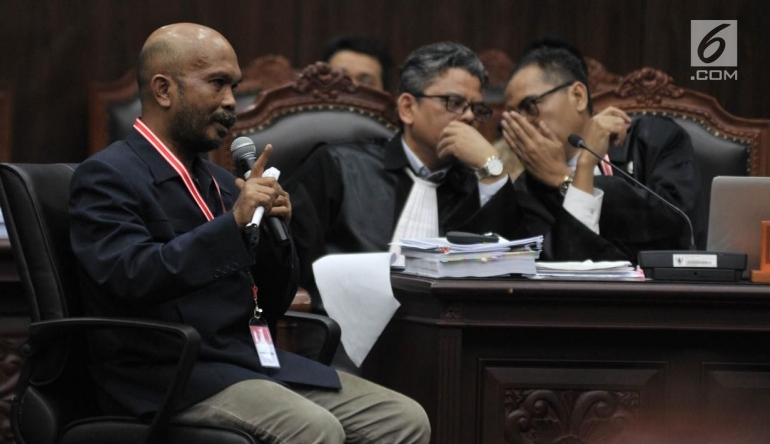 Idham Amiruddin saat memberi kesaksian di sidang Mahkamah Konstitusi (sumber foto: liputan6.com)