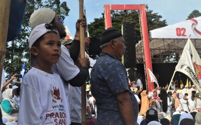 Seorang anak di kampanye 02 | https://tangerang7.com