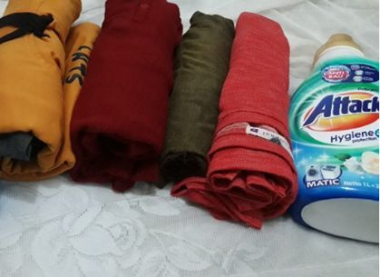 Baju kaus digulung biar lebih rapi dan tidak makan tempat (dokpri)