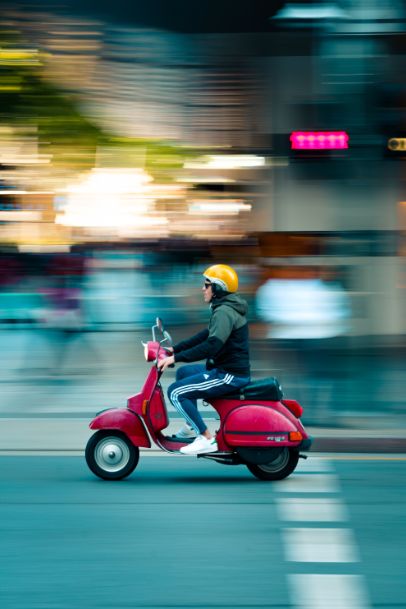 Credit imgaes https://www.pexels.com/photo/photo-of-man-riding-red-motor-scooter-2549355/ 
