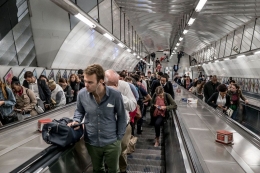 The Holborn Station in London at rush hour. To help reduce backups at the bottom of escalators, the station is experimenting with asking riders to stand side by side instead of leaving the left lane open for walking.CreditCreditAndrew Testa for The New York Times 