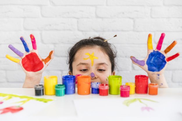https://www.freepik.com/free-photo/girl-looking-multicolored-paint-bottles-white-desk-with-her-painted-palms_4118158.htm#page=2&query=children&positio