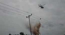 Helikopter yang memadamkan api beberapa waktu lalu di Pelang, Matan Hilir Selatan, Ketapang Kalbar. Foto dok: Rzl/YP