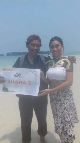 Hasil kerja kreatifnya, jadi Juara 3 Lomba Body Painting pada Oceanic Folk Festival di Pulau Gusung Patrick 2019. Dokumen: Iskandar Hd.